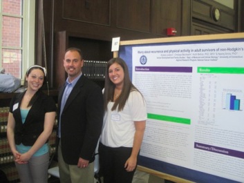 Undergraduate students Chelsea Bleckwehl (left) and Alyssa Loutsion (right) presenting at the Frontiers in Undergraduate Research Exhibit at UConn